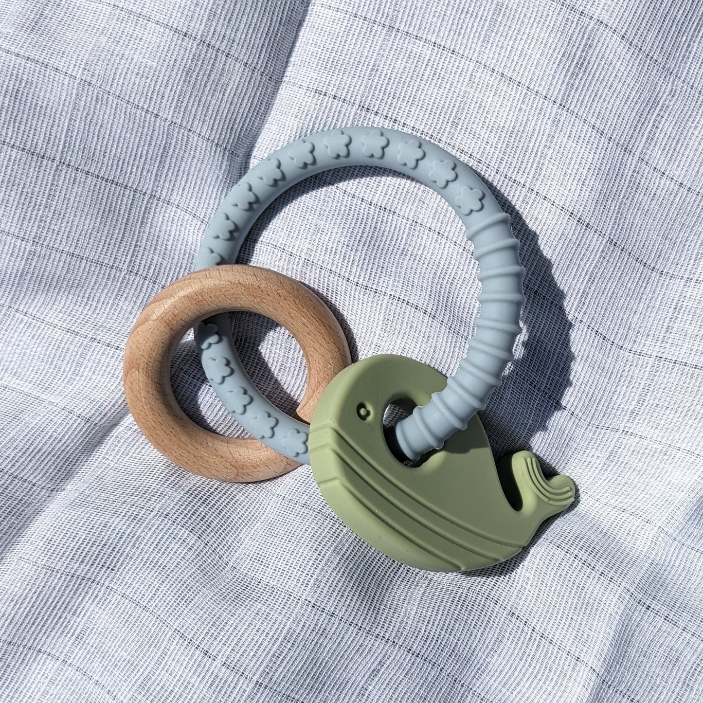 Mordedor de silicona orgánica azul